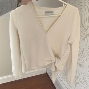 Cream colored wrap top